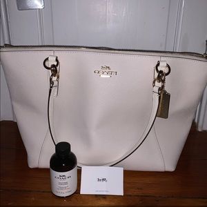 White coach bag